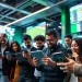Experience the excitement of the best sportsbooks in Brazil through betting enthusiasts immersed in a lively environment.